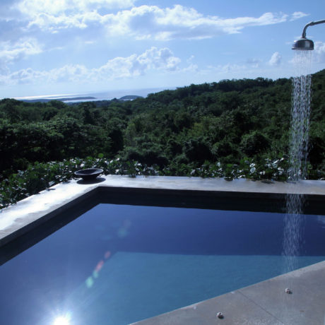 Pool view of the Caribbean and lush surroundings at Casa Angular